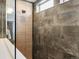 Contemporary shower with sleek tile design and a modern showerhead at 5755 Boston St, Denver, CO 80238