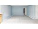 Large basement area with neutral carpet at 6385 S Nelson Way, Littleton, CO 80127