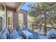 Relaxing balcony area with comfortable seating, stylish decor, and views provides an inviting outdoor retreat at 3795 Depew St # D, Wheat Ridge, CO 80212