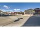 Vibrant streetscape showcasing local businesses, pedestrian-friendly walkways, and community amenities at 3795 Depew St # D, Wheat Ridge, CO 80212