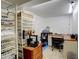 Finished basement with 3D printer and workspace at 10395 Red Mountain E, Littleton, CO 80127