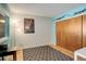 Bright bedroom with wood floors, a large closet and a window at 10395 Red Mountain E, Littleton, CO 80127