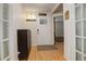 Bright and spacious entryway with hardwood floors and storage at 10395 Red Mountain E, Littleton, CO 80127