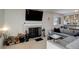 Living room with fireplace and comfortable sectional sofa at 10395 Red Mountain E, Littleton, CO 80127