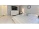 Spacious bedroom with plush carpeting, white dresser, and a 'Welcome Home' pillow at 4068 S Atchison Way # 101, Aurora, CO 80014