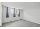 Well-lit bedroom with grey carpet and window at 9220 E Girard Ave # 2, Denver, CO 80231