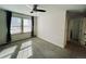 Inviting bedroom with ceiling fan, carpet, and great natural light at 14396 E Temple Pl # A, Aurora, CO 80015