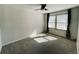 Inviting bedroom with ceiling fan, carpet, and great natural light at 14396 E Temple Pl # A, Aurora, CO 80015