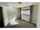 Bedroom featuring a window with curtains, and light-colored walls at 14396 E Temple Pl # A, Aurora, CO 80015