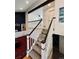 Carpeted stairs with white and dark wood trim at 14396 E Temple Pl # A, Aurora, CO 80015