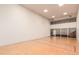 A racquetball court provides a recreational space within the home, perfect for fitness and fun at 2325 S Linden Ct # 211, Denver, CO 80222