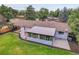 Aerial view showcasing home's backyard and patio at 5576 E Lehigh Ave, Denver, CO 80237