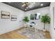 Bright home office with hardwood floors and modern desk at 5576 E Lehigh Ave, Denver, CO 80237