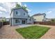 Spacious backyard featuring a well-maintained lawn and new patio space at 5068 E Crestone Ave, Castle Rock, CO 80104