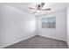 Well-lit bedroom with neutral carpet and a bright window at 5068 E Crestone Ave, Castle Rock, CO 80104