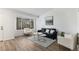 Bright living room featuring a large window, contemporary furnishings, and stylish decor at 5068 E Crestone Ave, Castle Rock, CO 80104