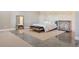 Bright and airy bedroom featuring a modern accent wall, sleek flooring, and ample space at 2480 Castle Butte Dr, Castle Rock, CO 80109