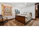 Charming bedroom featuring a decorative quilt, comfortable carpeting, and neutral paint at 2480 Castle Butte Dr, Castle Rock, CO 80109