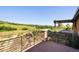 Beautiful deck with an exceptional outdoor view and pergola with outdoor seating at 2480 Castle Butte Dr, Castle Rock, CO 80109