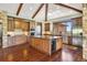 Spacious kitchen with custom cabinets, island, and stainless steel appliances at 2480 Castle Butte Dr, Castle Rock, CO 80109
