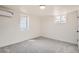 Finished basement featuring neutral carpet, natural light, and clean walls at 3780 Benton St, Wheat Ridge, CO 80212