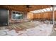 Large outdoor patio space featuring wood paneled ceilings, tile base, and stone accents at 748 W 100Th Ave, Northglenn, CO 80260