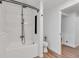 Clean modern bathroom featuring a white tiled shower and sleek fixtures at 9212 Tanglewood Rd, Franktown, CO 80116