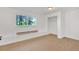 Bedroom with carpet and large window providing natural light at 9212 Tanglewood Rd, Franktown, CO 80116