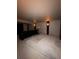 Finished basement featuring neutral colors and a black leather sofa at 5151 S Laredo Ct, Centennial, CO 80015