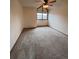 Bedroom features a ceiling fan and natural light from the window at 5151 S Laredo Ct, Centennial, CO 80015