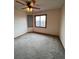 Bedroom with carpet and window allowing natural light into the space at 5151 S Laredo Ct, Centennial, CO 80015