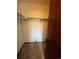Walk-in closet features neutral carpet and built-in shelf for organized storage at 5151 S Laredo Ct, Centennial, CO 80015