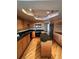 Stylish kitchen showcasing granite countertops, stainless steel appliances, custom cabinetry, and hardwood floors at 5151 S Laredo Ct, Centennial, CO 80015