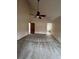 Expansive main bedroom with plush carpet, ceiling fan, ensuite bathroom, and large windows at 5151 S Laredo Ct, Centennial, CO 80015