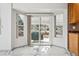 Bright kitchen nook with sliding glass doors leading to outdoor living space at 24526 E Bellewood Dr, Aurora, CO 80016