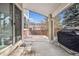 This covered patio provides a shady and inviting space for relaxing or entertaining outdoors at 24526 E Bellewood Dr, Aurora, CO 80016