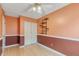 Bright bedroom with a closet, ceiling fan, and unique wall mounted shelving at 9605 W David Ave, Littleton, CO 80128