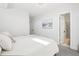 Sunlit bedroom with access to a connecting bathroom, featuring a relaxing atmosphere and clean, modern design at 25 S Washington St # 2, Denver, CO 80209