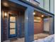 Modern entrance featuring a gray door with brick and metal accents and recessed lighting at 25 S Washington St # 2, Denver, CO 80209