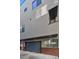 Contemporary exterior view of the building including a garage with a modern design at 25 S Washington St # 2, Denver, CO 80209