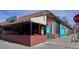 Inviting restaurant exterior featuring outdoor seating, vintage signage, and artistic murals at 25 S Washington St # 2, Denver, CO 80209