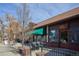 Charming building with outdoor seating and awnings, home to a local sandwich shop at 25 S Washington St # 2, Denver, CO 80209