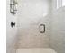 Modern bathroom featuring a frameless glass shower with gray subway tile and matte black hardware at 25 S Washington St # 2, Denver, CO 80209