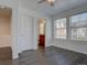 Bright bedroom with light gray wood-look floors and natural light from the double windows at 9520 Halstead, Lone Tree, CO 80124