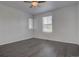 Bright bedroom offers a ceiling fan, large windows, and hardwood flooring at 9520 Halstead, Lone Tree, CO 80124