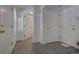 Hallway featuring hardwood floors, closet, and neutral paint at 9520 Halstead, Lone Tree, CO 80124