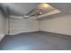 Spacious garage with painted floor and white walls at 9520 Halstead, Lone Tree, CO 80124