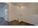 Bright landing area on a staircase with fresh paint and modern flooring at 9520 Halstead, Lone Tree, CO 80124