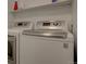 Laundry room with modern washer and dryer at 9520 Halstead, Lone Tree, CO 80124