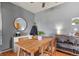 Cozy dining area with hardwood floors, modern lighting, and ample seating at 8481 W Union Ave # 13203, Denver, CO 80123